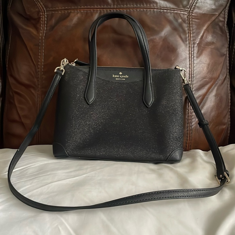 I am selling a black sparkling Kate spade purse